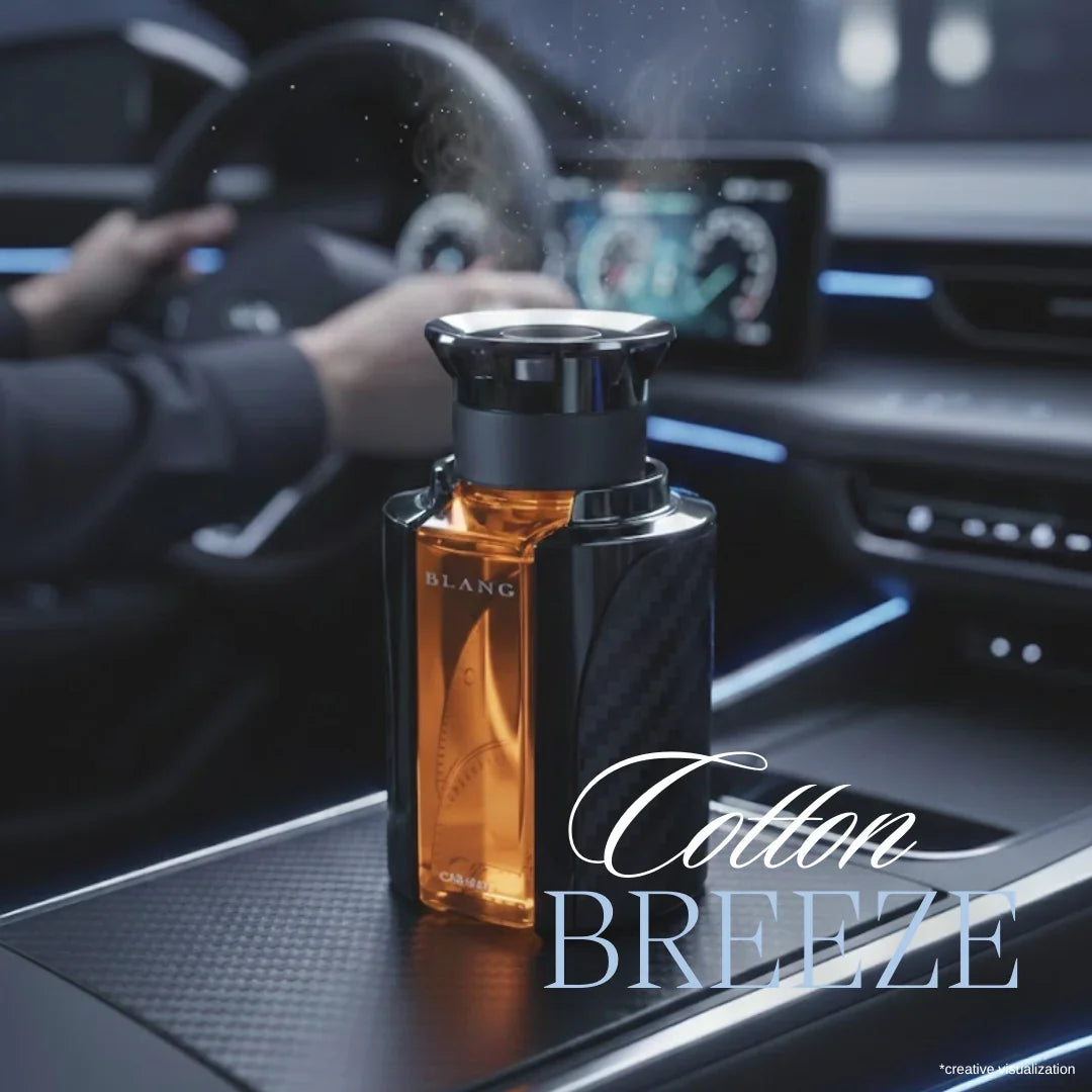 Cotton Breeze car perfume diffuser with amber liquid, sleek black design, emitting fragrance inside modern car interior