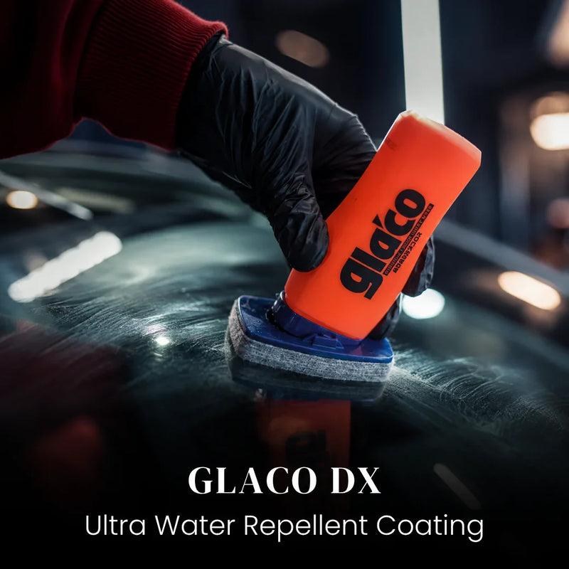 Applying GLACO DX ultra water repellent coating to car windshield with applicator pad
