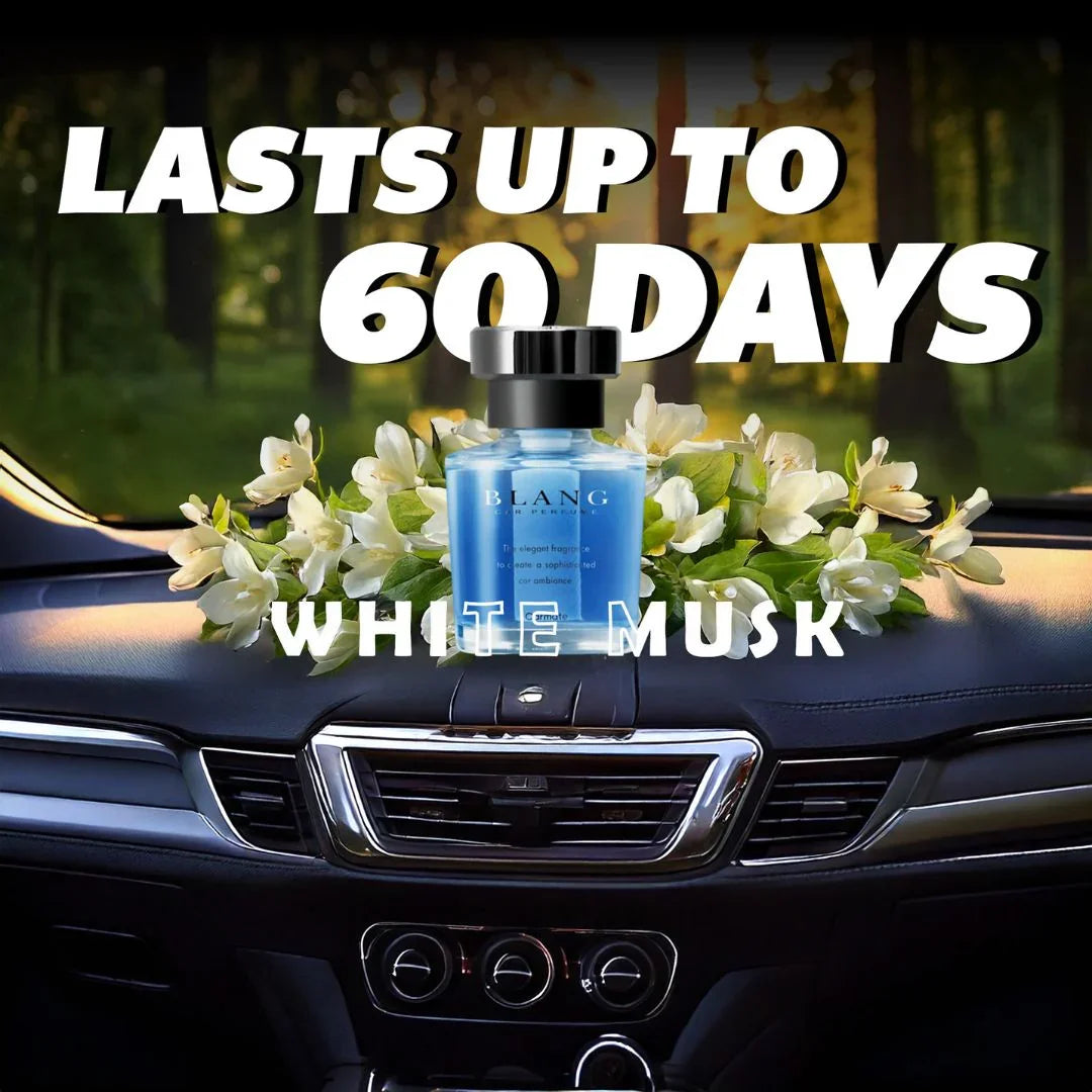 White Musk car perfume lasts up to 60 days, displayed on dashboard with flowers, long-lasting fragrance for cars